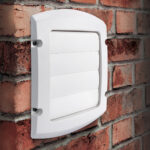 Panoramic view of empty, old, red brick wall background with cop