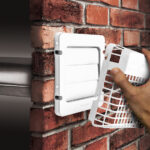 Panoramic view of empty, old, red brick wall background with cop