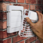 Panoramic view of empty, old, red brick wall background with cop